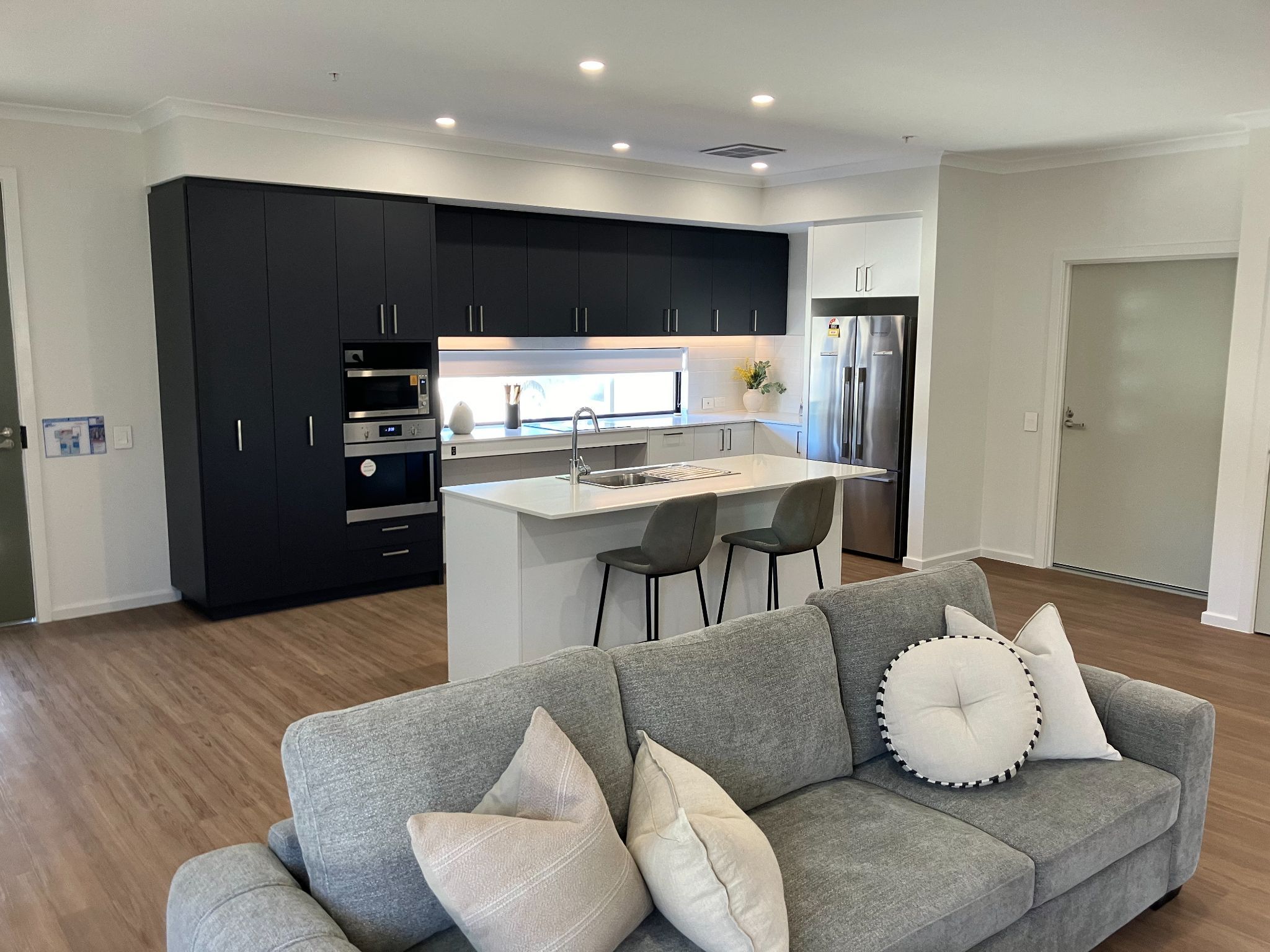 Living area with the kitchen behind