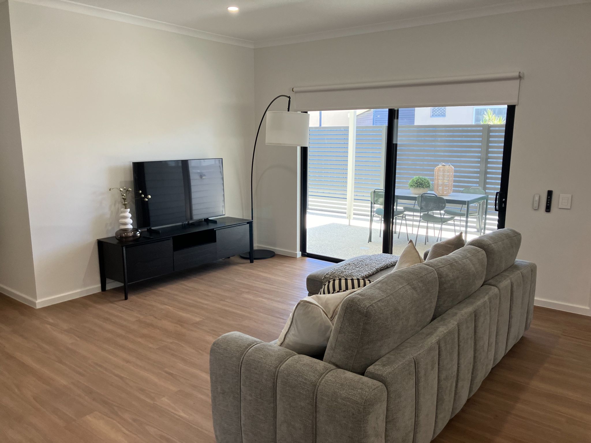 Living area with a couch and TV