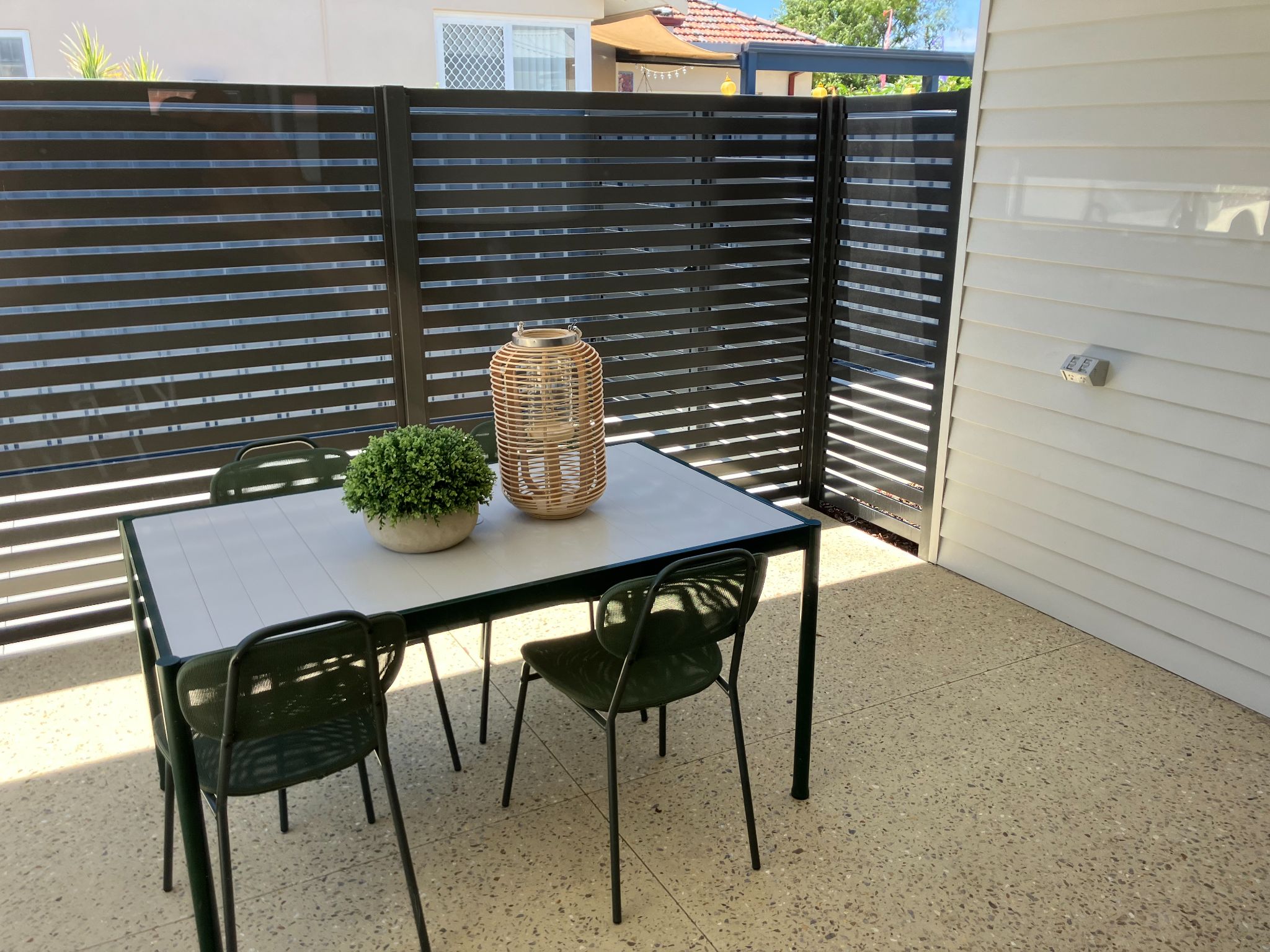 Outdoor patio with table and chairs
