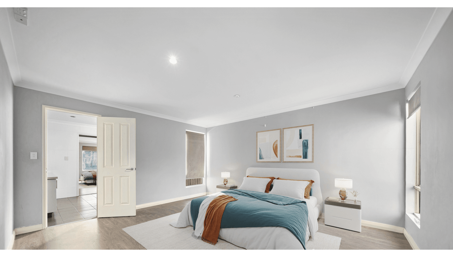 Modern, accessible second bedroom in a Supported Independent Living (SIL) Home in Morley, Australia, featuring light wood flooring, neutral tones, and ensuite access, part of Australia’s leading disability accommodation provider.