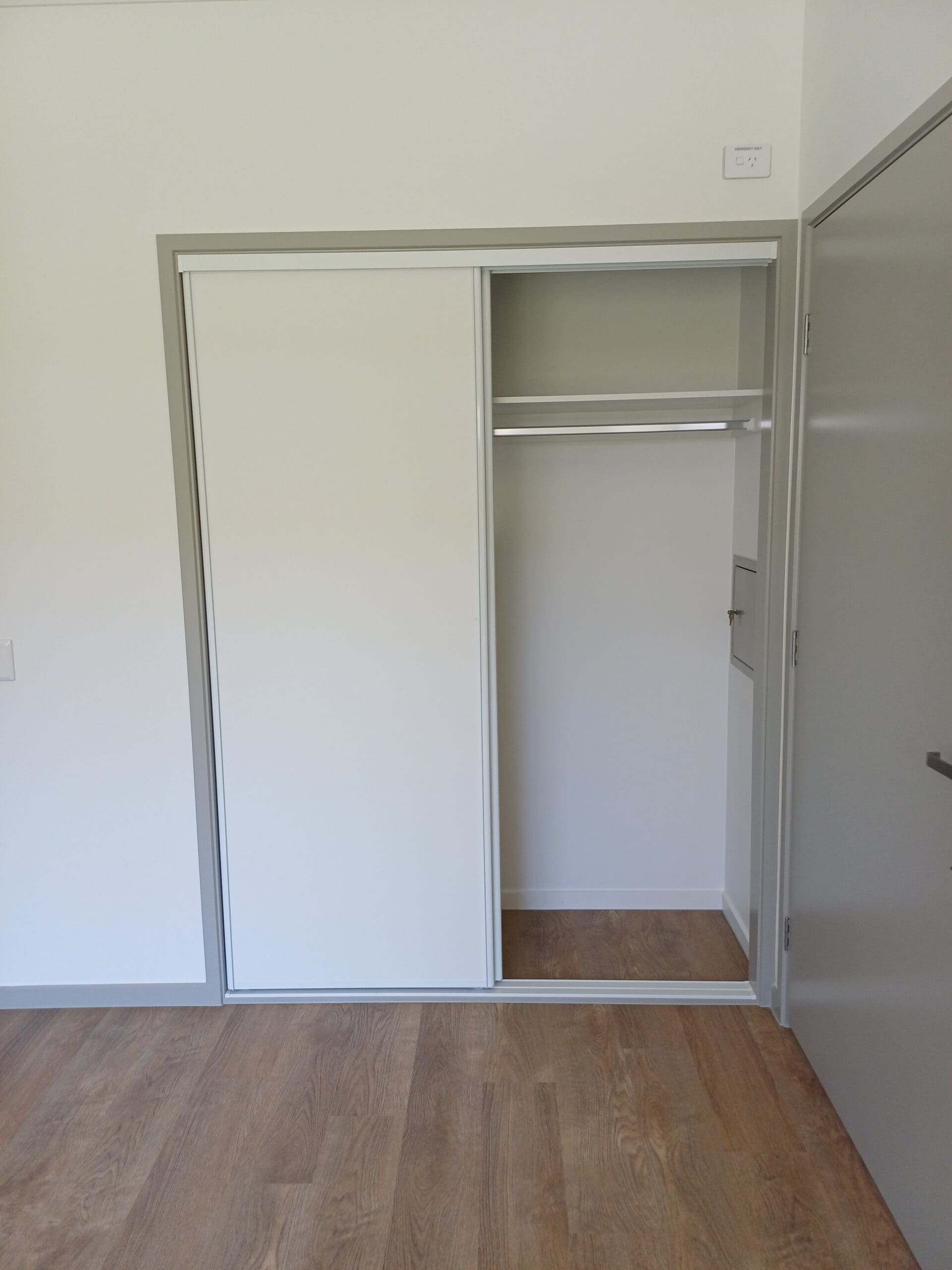 Accessible built-in wardrobe in Purpose-Built High Physical Support Living in Cleveland, Langdon Street, featuring sliding doors, clear storage, and safety features, part of Australia’s leading disability accommodation provider.