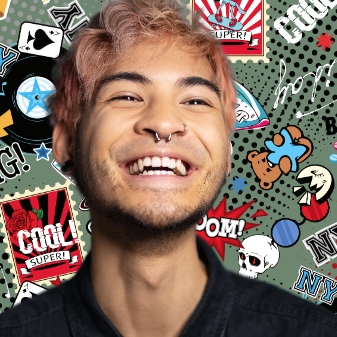 A young boy with pink hair look happy and smiling at camera