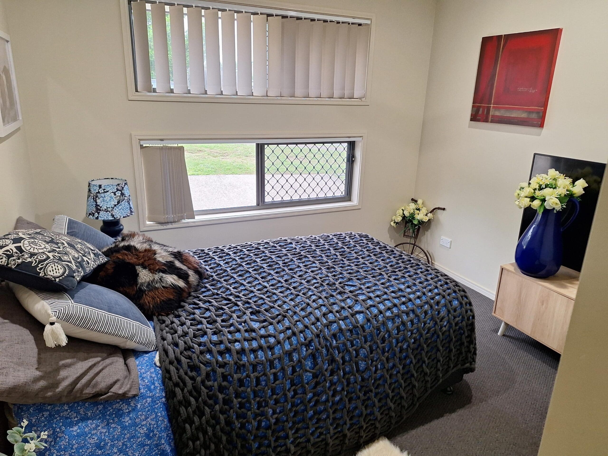 Tranquil bedroom in our welcoming and cosy SIL home, Brassall, Ipswich, designed for comfort, routine, and independence by Australia’s leading disability accommodation provider.