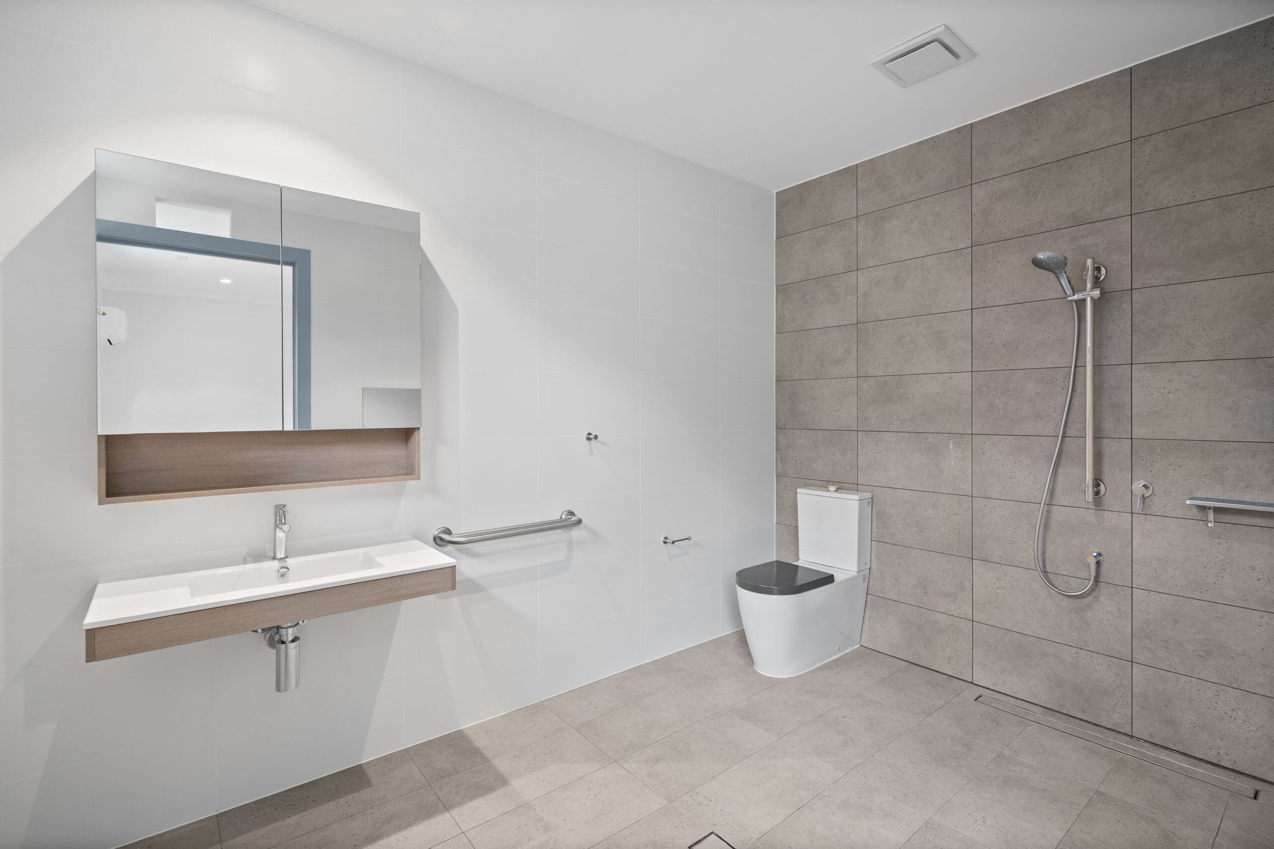 A home in Mount Barker that's built for living with an accessible bathroom, open shower, grab rails and modern fittings by Australia's leading disability accommodation provider.