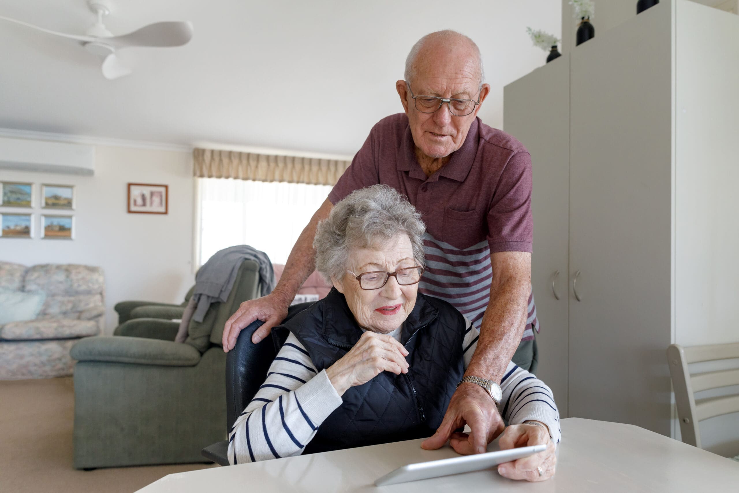 Older Australian client discussing their grandfathered Home Care Package with a Kanda Care Coordinator online