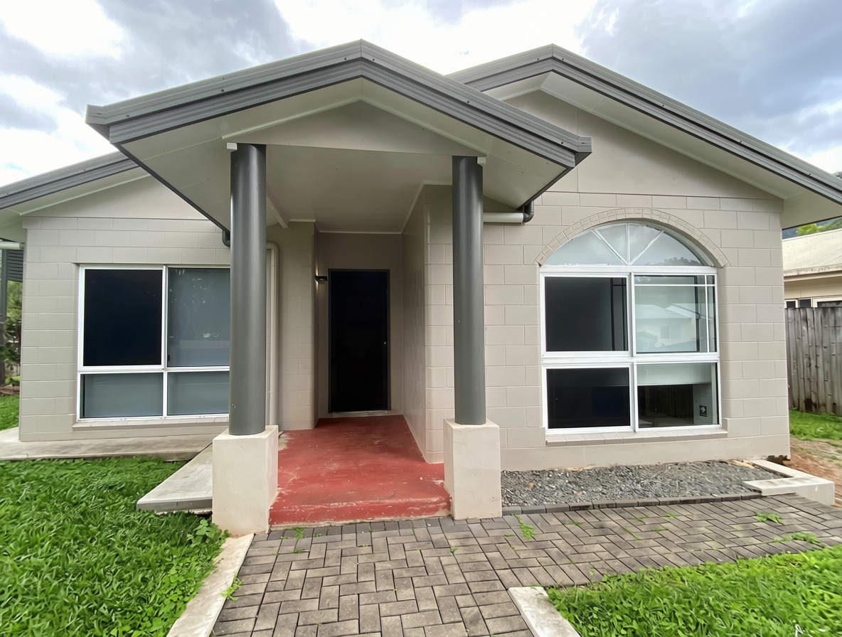 SIL Vacancy in Bentley Park, Cairns, Lorraine Close, Bentley Park exterior with covered front entry, paved driveway and large windows by Australia's leading disability accommodation provider.
